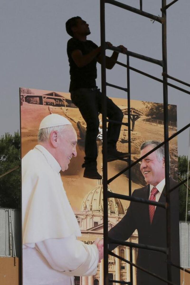 Workers prepare Amman International Stadium for Pope Francis’ visit, in Amman, Jordan. Muhammad Hamed / Reuters