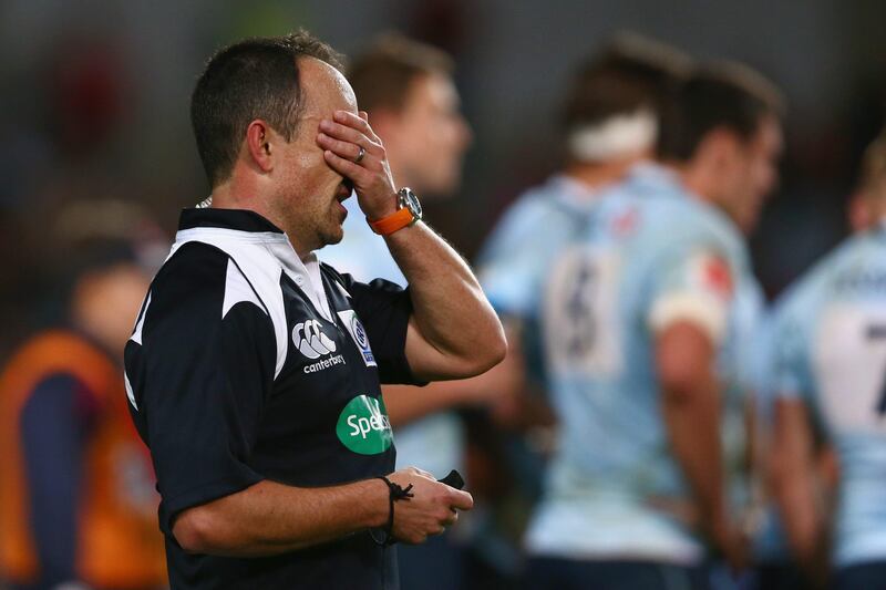 SYDNEY, AUSTRALIA - JUNE 15:  Referee Jaco Peyper wipes sweat from his face during the match between the NSW Waratahs and the British & Irish Lions at Allianz Stadium on June 15, 2013 in Sydney, Australia.  (Photo by Mark Kolbe/Getty Images) *** Local Caption ***  170601148.jpg