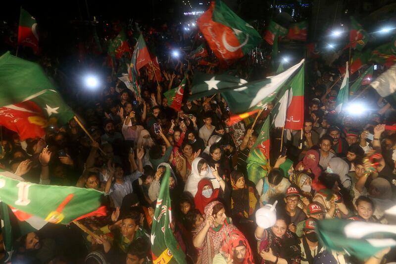 Supporters of former Pakistan prime minister Imran Khan block a road in Karachi during a protest. AP