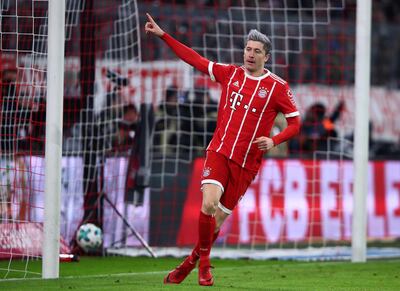 Soccer Football - Bundesliga - Bayern Munich vs FC Cologne - Allianz Arena, Munich, Germany - December 13, 2017   Bayern Munich's Robert Lewandowski celebrates scoring their first goal    REUTERS/Michael Dalder    DFL RULES TO LIMIT THE ONLINE USAGE DURING MATCH TIME TO 15 PICTURES PER GAME. IMAGE SEQUENCES TO SIMULATE VIDEO IS NOT ALLOWED AT ANY TIME. FOR FURTHER QUERIES PLEASE CONTACT DFL DIRECTLY AT + 49 69 650050