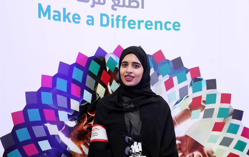 RAK , UNITED ARAB EMIRATES , OCT 31   – 2017 :- Shuaa Masood ( volunteer ) at the Special Olympics stand during the Emirates Foundation Youth Summit 2017 held at Ras Al Khaimah Exhibition Centre in Ras Al Khaimah. (Pawan Singh / The National) Story by Ruba Haza