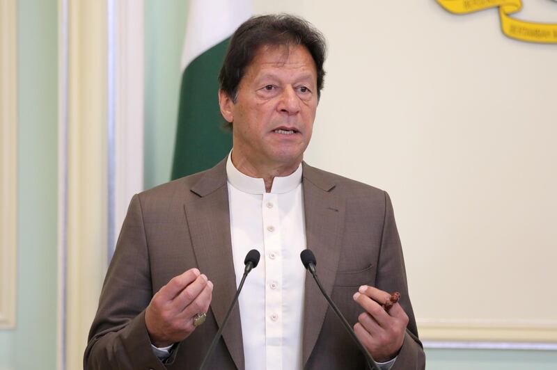 FILE PHOTO: Pakistan's Prime Minister Imran Khan speaks during a joint news conference with Malaysia's Prime Minister Mahathir Mohamad (not pictured) in Putrajaya, Malaysia, February 4, 2020. REUTERS/Lim Huey Teng/File Photo