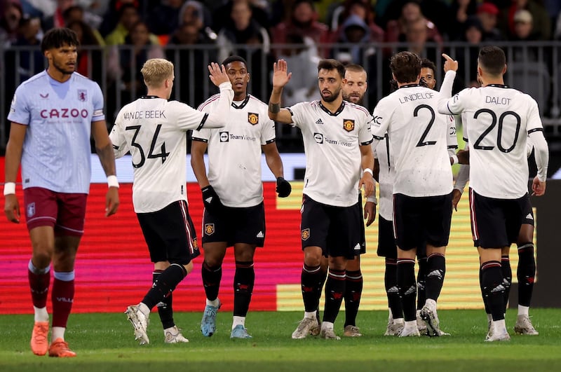 Bruno Fernandes and his Manchester United teammates celebrate a goal against Aston Villa at the Optus Stadium in Perth, Australia. EPA
