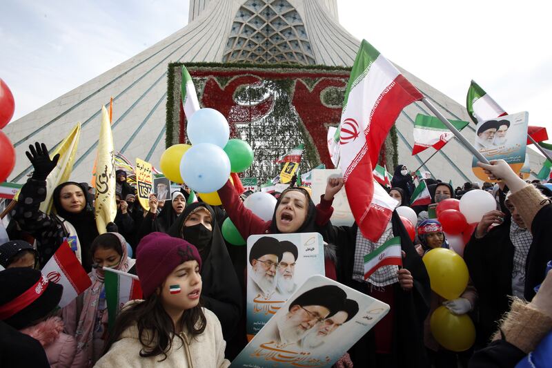  Iranians take part in an event to mark the 44th anniversary of the 1979 Islamic Revolution, in Tehran. EPA