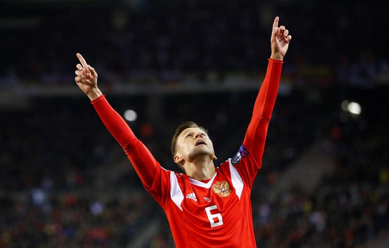 ussia's Denis Cheryshev celebrates scoring their first goal. Reuters