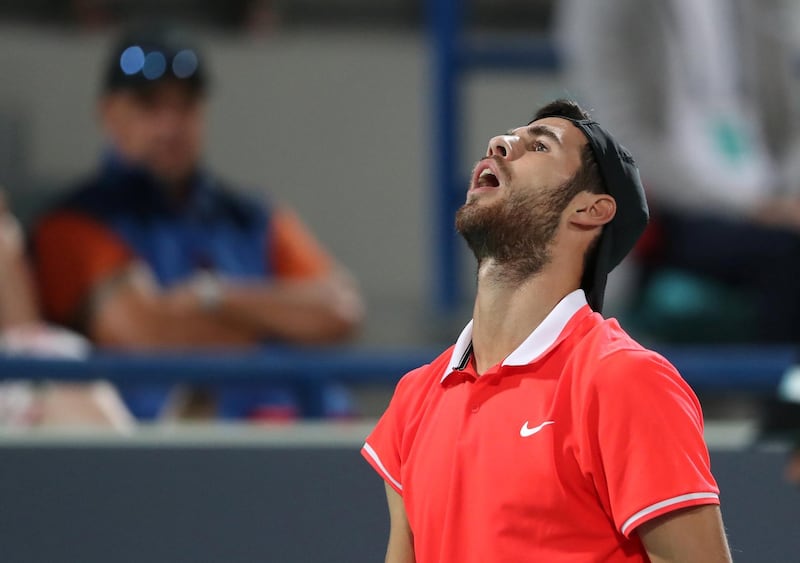 Russia's Karen Khachanov in action during the third-place match against Austria's Dominic Thiem at the Mubadala World Tennis Championship in Abu Dhabi on Saturday. Reuters