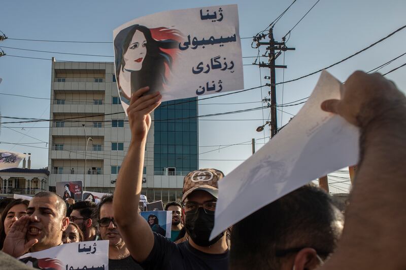 Protesters in Sulaimaniyah, Iraq in September to protest against the death of Mahsa Amini in police custody in Iran. AP