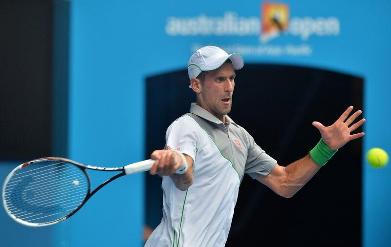 Novak Djokovic will follow up his Australian Open effort with a go at defending his Dubai Duty Free Tennis Championship title in February. Paul Crock / AFP