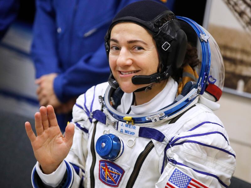 Jessica Meir waves prior the launch of Soyuz MS-15 space ship. Dmitri Lovetsky / AP