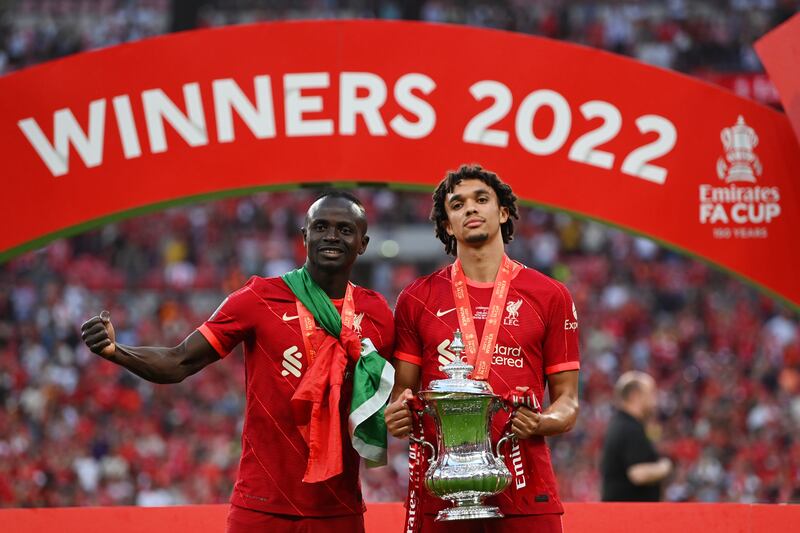Sadio Mane and Trent Alexander-Arnold of Liverpool celebrate with The Emirates FA Cup. Getty