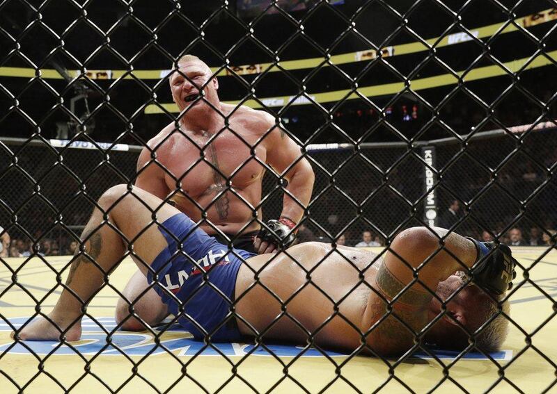 Brock Lesnar smiles after defeating Mark Hunt during their heavyweight bout at UFC 200, Saturday, July 9, 2016, in Las Vegas. John Locher / AP Photo