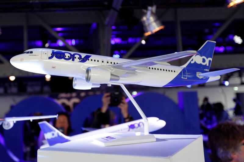 The logo of the new "Joon" lower-cost airline is pictured on a plane scale model during a news conference in Paris, France, September 25, 2017.   REUTERS/Charles Platiau