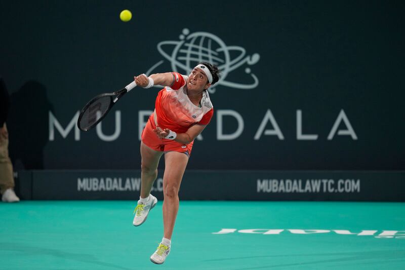 Ons Jabeur serves to Emma Raducanu during their match at the Mubadala World Tennis Championship in Abu Dhabi. AP
