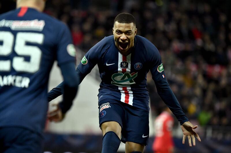 Paris Saint-Germain's French forward  Kylian Mbappe celebrates after an own goal by a Dijon player during the French Cup quarter final football match Dijon (DFCO) vs Paris Saint-Germain (PSG) on February 12, 2019 at the Gaston Gerard stadium in Dijon. / AFP / JEFF PACHOUD

