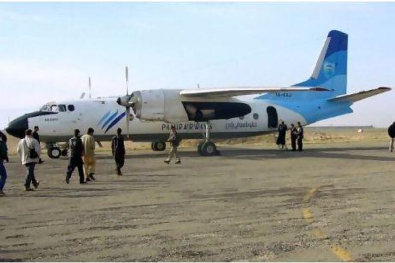 A Pamir Airways Antonov AN-24 waits for passengers at the airport of Kunduz, Afghanistan. Can Merey / EPA