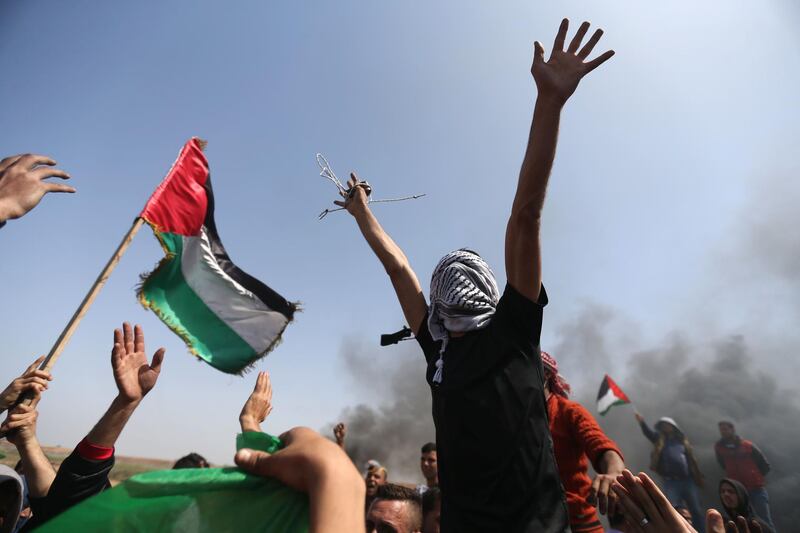 The number of protesters, however, was lower than last week, when a demonstration by tens of thousands led to clashes in which Israeli forces killed 19 Palestinians on March 30. Mohammed Abed / AFP