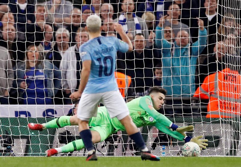 Manchester City's Sergio Aguero scores from the penalty spot during the shootout. Action Images via Reuters