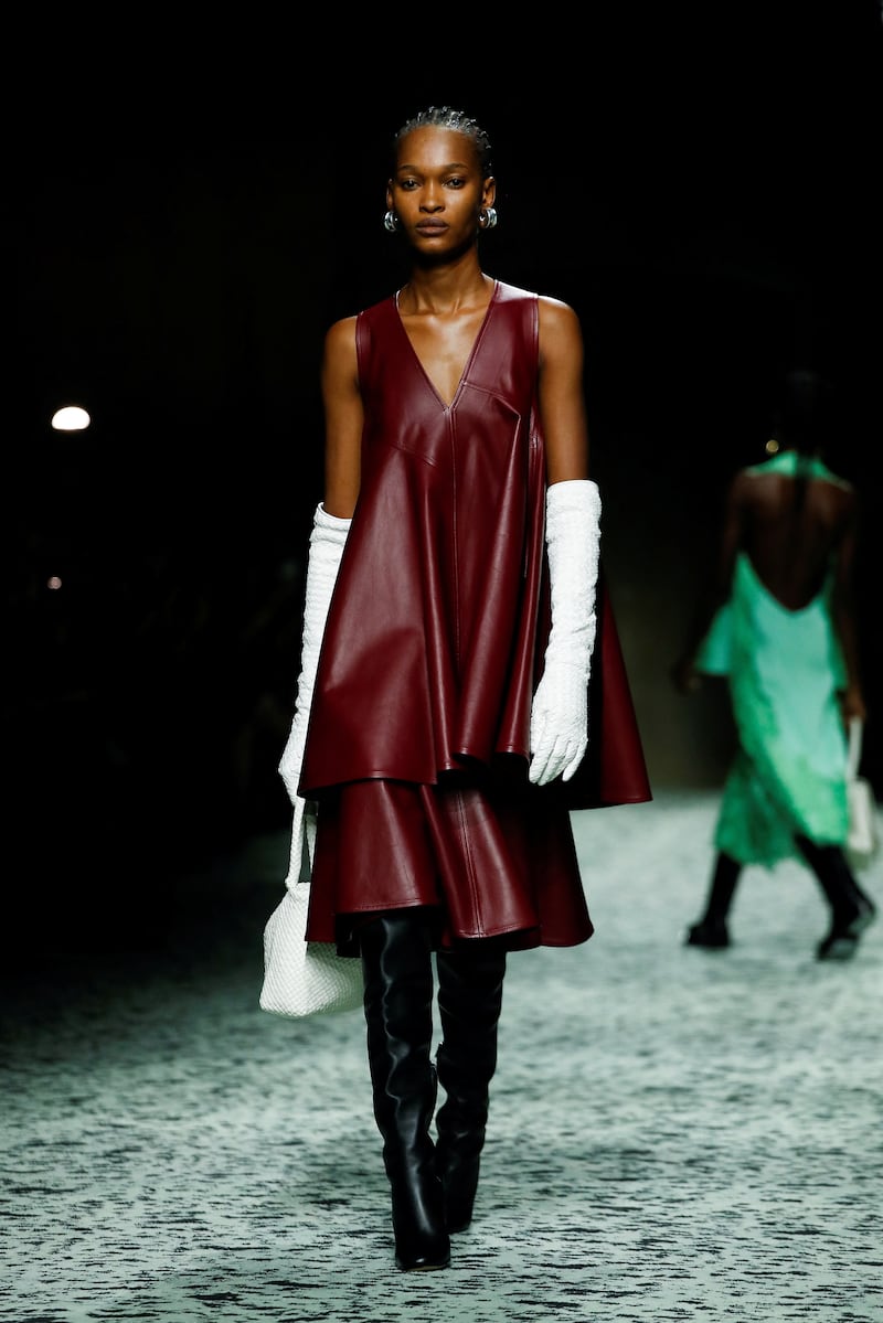 A top and skirt in oxblood leather at Bottega Veneta. Reuters