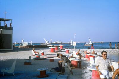 The main beach at The Club in the mid-1970s when cable drums functioned as tables. Photo: The Club