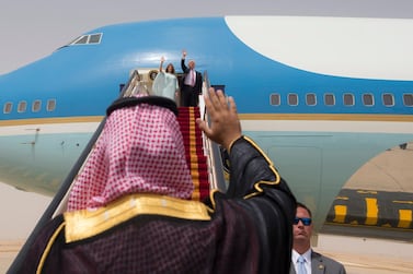 US President Donald Trump and First Lady Melania wave as they board Air Force One before leaving Riyadh for Israel in May 2017. Saudi Royal Palace / AFP