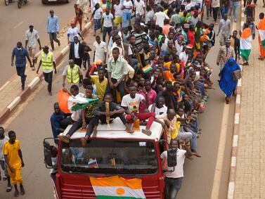 People rally in Niamey, Niger, after the departure of the French ambassador from the country. EPA