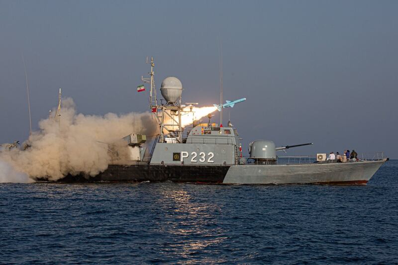 Iranian troops fire a Ghaidr missile during the second day of military exercise in the northern Sea of Oman, on November 8, 2021. Iranian Army via EPA