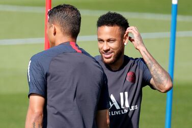 Neymar, right, may wish to belong somewhere else but his mission to get there will be helped by enjoying the company he keeps and making gestures of collegiate generosity. Reuters