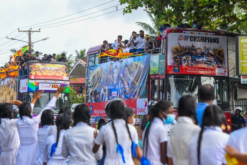 Kids welcome the victorious Sri Lankan team in Colombo. AFP
