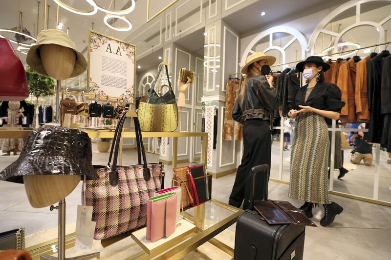 Dubai, United Arab Emirates - Reporter: Panna Munyal. Fashion. Shopping. Bags and Hats from A&A and leather jackets and cashmere garments from Anthemis. Pop-up of eight Italian boutique brands at Galeries Lafayette at The Dubai Mall. Tuesday, March 23rd, 2021. Dubai. Chris Whiteoak / The National