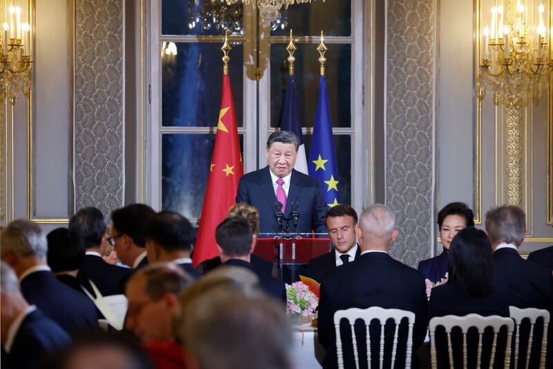 Mr Xi speaks during the official state dinner. EPA
