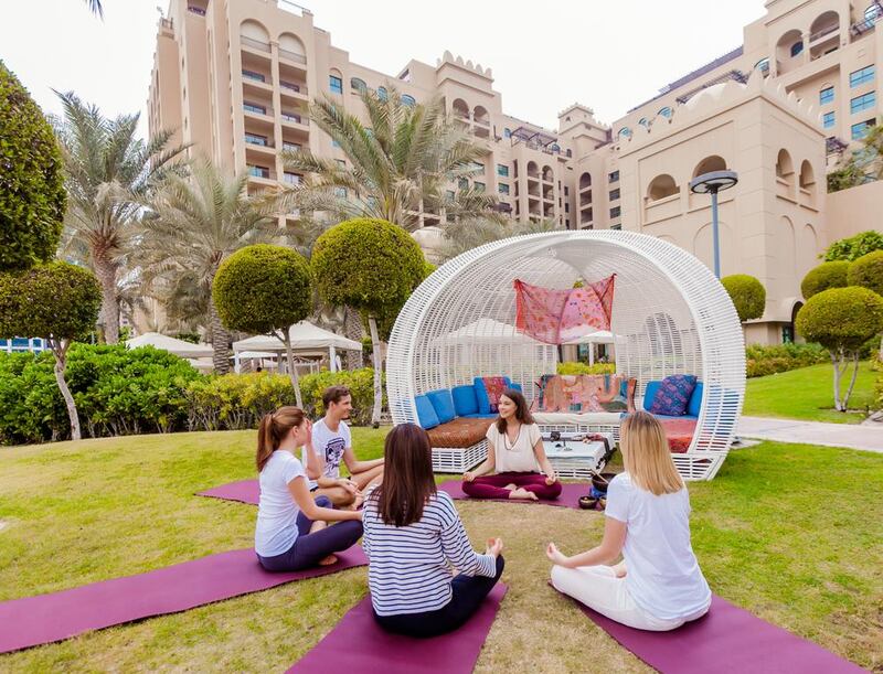 Take part in a sound relaxation class at Fairmont The Palm that includes gongs and singing bowls. Courtesy Fairmont The Palm