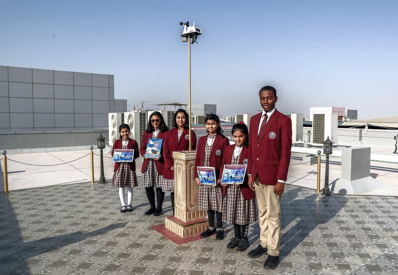 Abu Dhabi, U.A.E., October 11, 2018. ADEK has ranked four schools as outstanding this year. Merryland School is on the list for the first time. --  Students at the roofdeck weather station.
Victor Besa / The National
Section:  NA
Reporter:  Anam Rizvi
