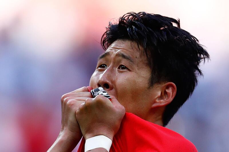 (FILES) In this file photo taken on June 27, 2018, South Korea's forward Son Heung-min celebrates scoring during the Russia 2018 World Cup Group F football match between South Korea and Germany at the Kazan Arena in Kazan. - Son Heung-min has lit up the World Cup and the Premier League but unnervingly it is the Asian Games in Indonesia, which starts on August 18, 2018, that could make or break the career of the prolific South Korean forward. Anything less than gold and Son, 26, faces a compulsory stint of nearly two years' military service -- a severe blow to the player, his national team and his club, Tottenham Hotspur. (Photo by Benjamin CREMEL / AFP) / RESTRICTED TO EDITORIAL USE - NO MOBILE PUSH ALERTS/DOWNLOADS