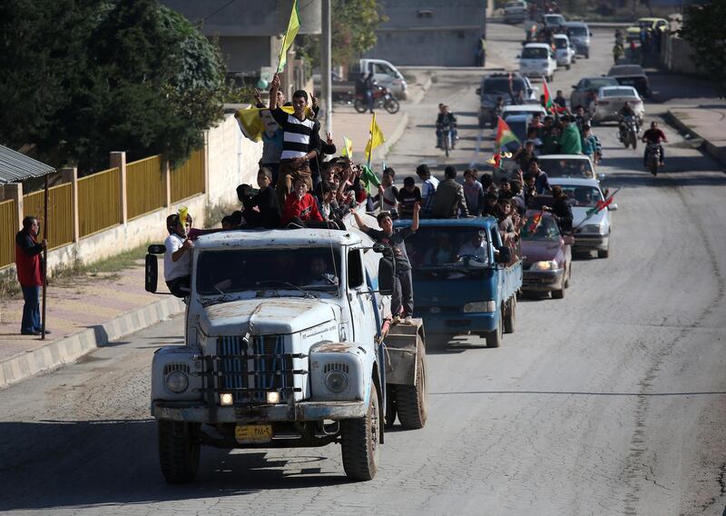 DEREK, SYRIA - NOVEMBER 13:  Yazidi refugees celebrating news of the liberation of their homeland of Sinjar from ISIL extremists on November 13, 2015 in Derek, Rojava, Syria. Kurdish Peshmerga forces in Iraq say they have retaken Sinjar, with the help of airstrikes from U.S. led coalition warplanes. The Islamic State captured Sinjar in August 2014, killing many and sexually enslaving thousands of Yazidi women.  (Photo by John Moore/Getty Images)