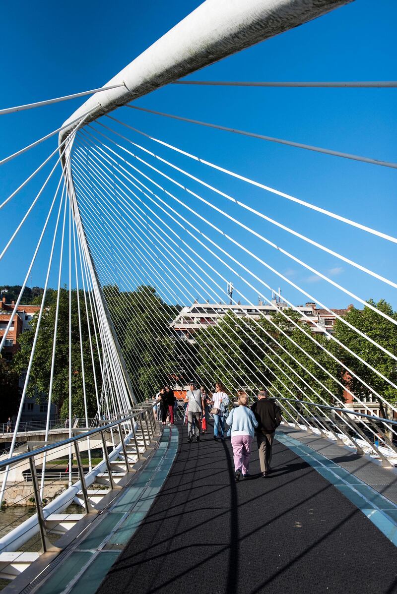 The pedestrian footbridge Zubizuri, created by Santiago Calatrava to resemble a sail, in Bilbao.