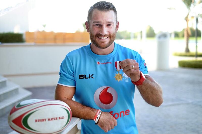 Jeremy Manning, a fitness instructor and rugby player in Abu Dhabi, was awarded the Officer of the Order of Fiji medal, for his role in the country winning gold in the Olympic Sevens. Delores Johnson / The National 