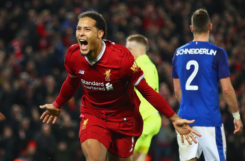 LIVERPOOL, ENGLAND - JANUARY 05:  Virgil van Dijk of Liverpool celebrates as he scores their second goal during the Emirates FA Cup Third Round match between Liverpool and Everton at Anfield on January 5, 2018 in Liverpool, England.  (Photo by Clive Brunskill/Getty Images)