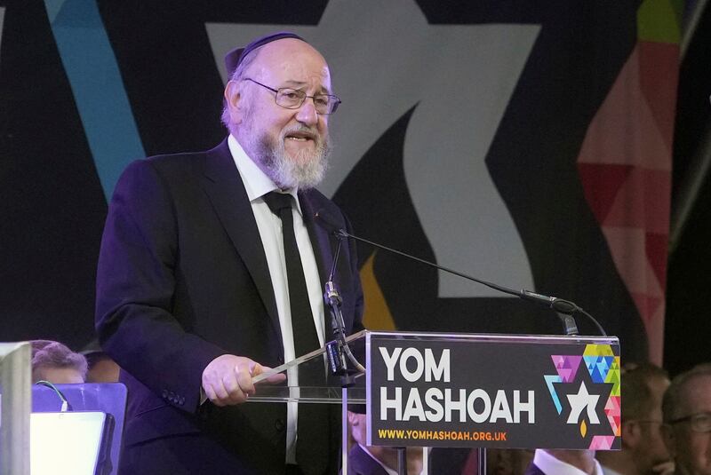 Chief Rabbi Sir Ephraim Mirvis speaks during the Yom Hashoah National Holocaust Remembrance Commemoration in Westminster, central London, Sunday May 5, 2024.  (Jeff Moore / PA via AP)