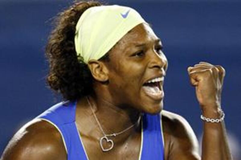 Serena Williams shows her delight at reaching the semi-finals of the women's Australian Open.