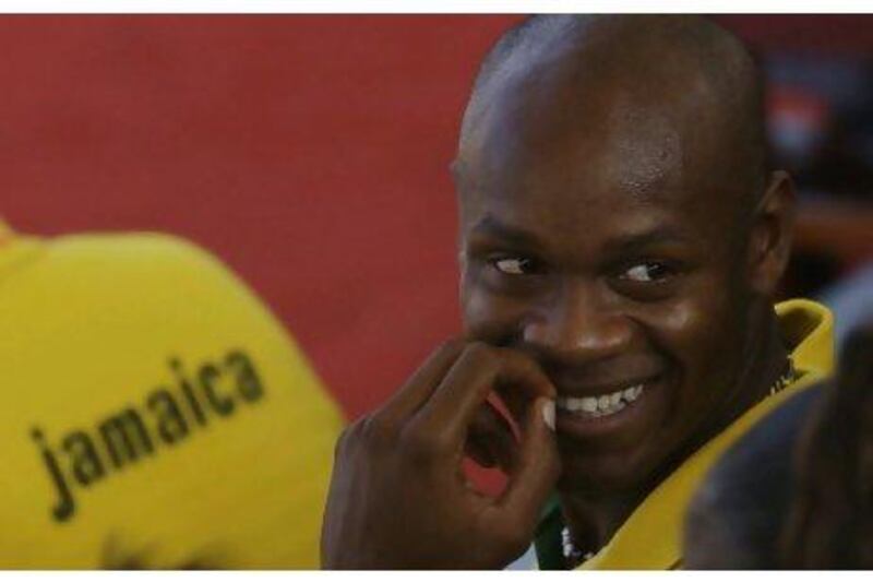 The sprinter Asafa Powell also enjoys racing with four wheels. AP Photo