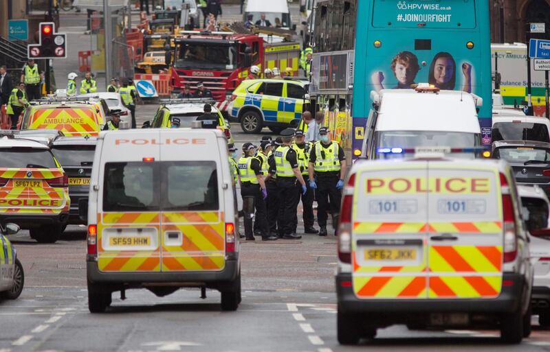 epa08510886 Police and emergency responders attend the scene of a stabbing incident in downtown Glasgow, Scotland, Britain, 26 June 2020. According to media reports, police have shot an attacker who had allegedly stabbed a number of people at a hotel.  EPA/Stringer