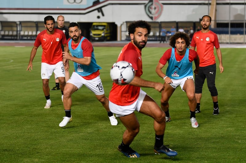 Egypt's Mohamed Salah, centre, takes part in a training session two days ahead of hosting the 2019 African Cup of Nations. Egypt's first match is against Zimbabwe in Cairo on Friday. AFP