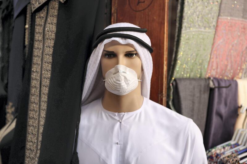 DUBAI, UNITED ARAB EMIRATES , July 2 – 2020 :- Mannequin  wearing protective face mask outside one of the garment shop at the Grand souq in Bur Dubai area in Dubai. (Pawan Singh / The National) For News/Standalone/Online/Stock/Instagram