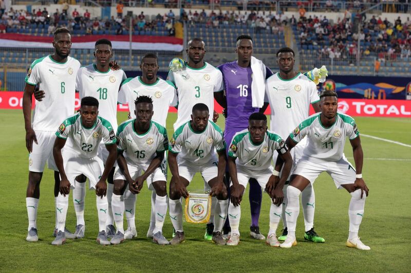 Senegal's players pose before the match. EPA