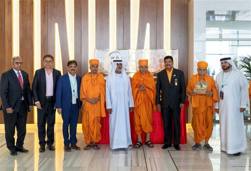 Devotees and dignitaries with His Excellency Sheikh Nahyan Mabarak Al Nahyan and His Holiness Mahant Swami Maharaj. courtesy: BAPS