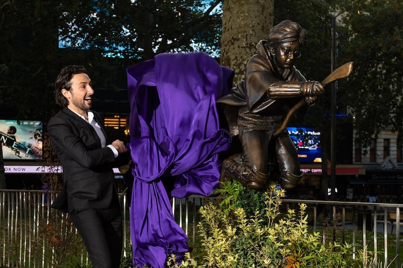Alex Zane unveils the new Harry Potter statue at Leicester Square as part of the Scenes in the Square film trail. Getty Images