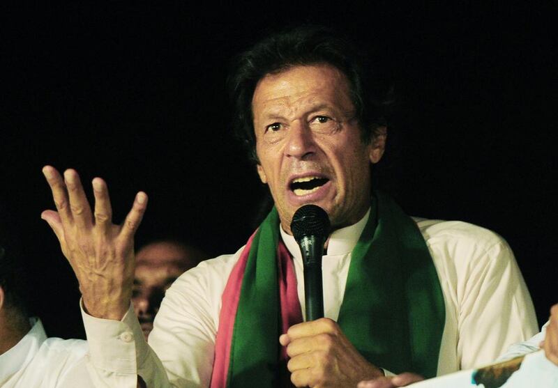 Imran Khan addresses his supporters. Asif Hassan/AFP Photo