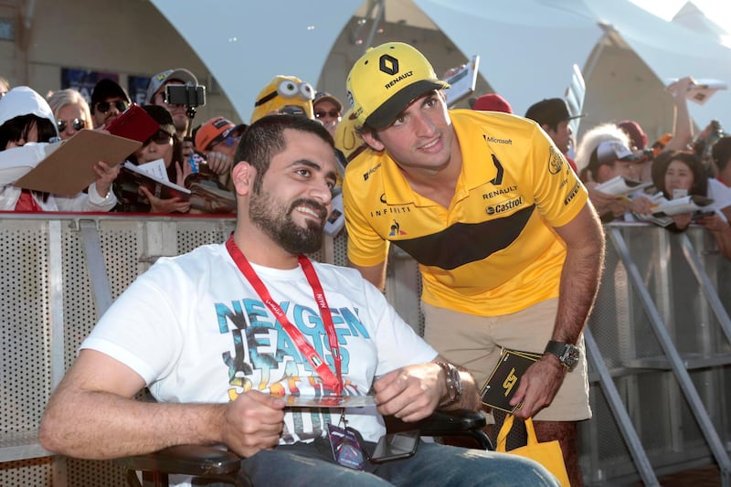 Carlos Sainz Jr greets his fans during an exclusive autograph signing session at Yas Marina Circuit. Courtesy Yas Marina Circuit