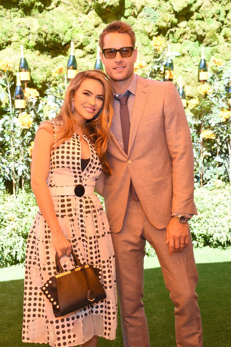 PACIFIC PALISADES, CALIFORNIA - OCTOBER 05: (L-R) Chrishell and Justin Hartley attend the 10th Annual Veuve Clicquot Polo Classic Los Angeles at Will Rogers State Historic Park on October 05, 2019 in Pacific Palisades, California.   Gregg DeGuire/Getty Images/AFP (Photo by GREGG DEGUIRE / GETTY IMAGES NORTH AMERICA / Getty Images via AFP)