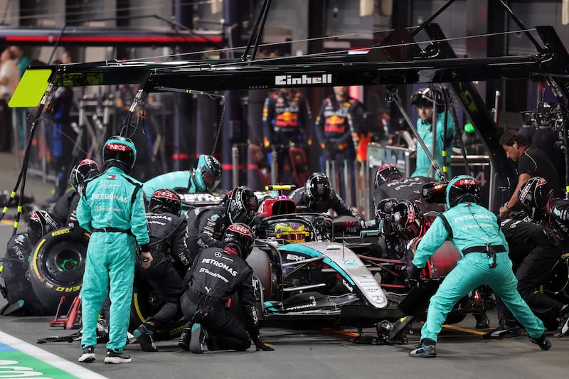 Mercedes' British driver Lewis Hamilton makes a pit stop. AFP